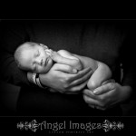 Glasgow baby photographers baby in dad's arms