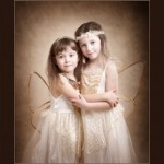 Glasgow photographers Sisters in Xmas angel outfits shot by greenock photographer angel images