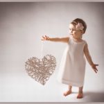 girl in a white dress with a with a wicker heart valentines day photography greenock Angel Images