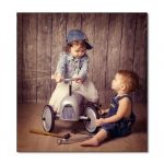 toddlers with a vintage car
