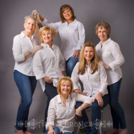 six womne in jeans and white shirts annie liebowitz style