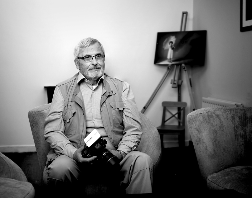 photographer, headshot, personal branding, black and white, man sitting