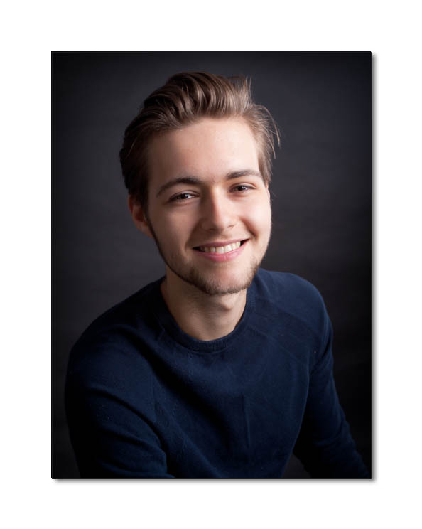 actor , headshot, man smiling